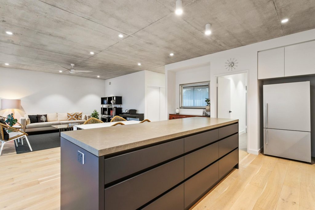 Teh Residence-Rossmoyne-Superseed Architecture-23 Teh Residence-Rossmoyne-Superseed Architecture-23-Black Kitchen Cabinets with Concrete Counter